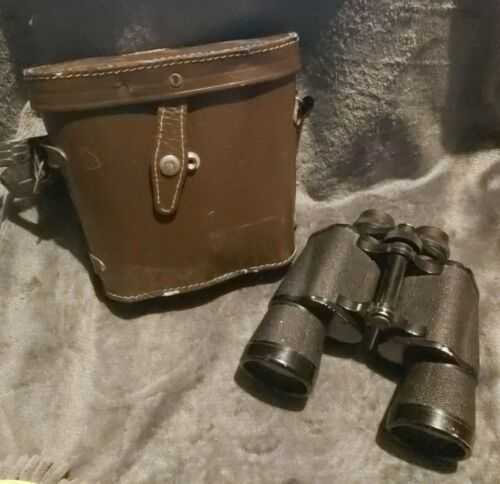 Pair of Binoculars with leather case by Regent 10x50