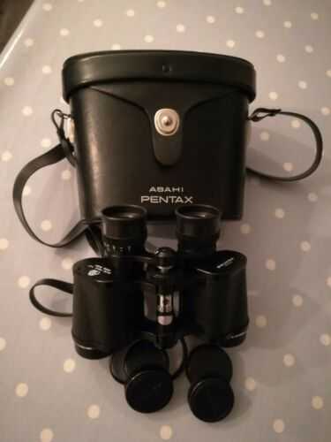 Asahi Pentax 8x30 Binoculars, field 7.5, including strap, case and lens caps.