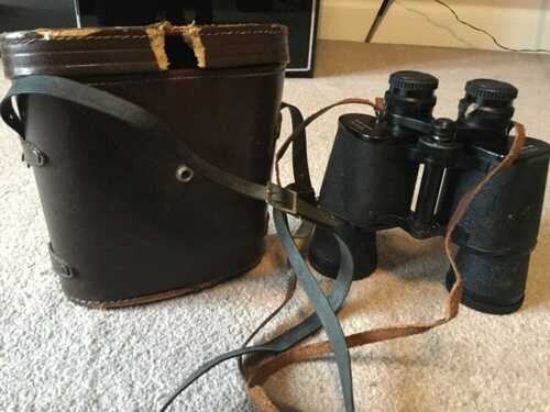 Vintage binoculars from boots. With brown case.