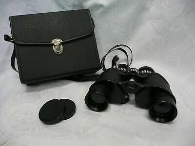 CASED PAIR OF COMMODORE 7X-14X35 BINOCULARS.