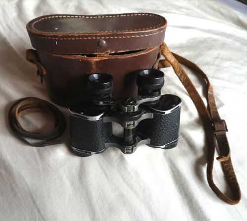 Vintage binoculars with leather case