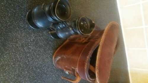 ww2 era binoculars in leather case in worn used condition