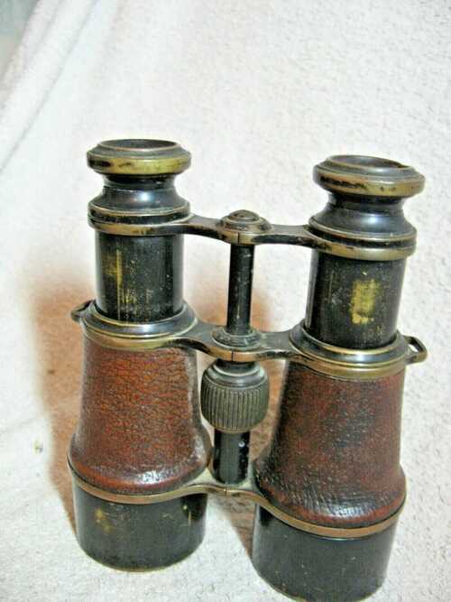 Used vintage binoculars one pair First World War Period..extending lenses covers