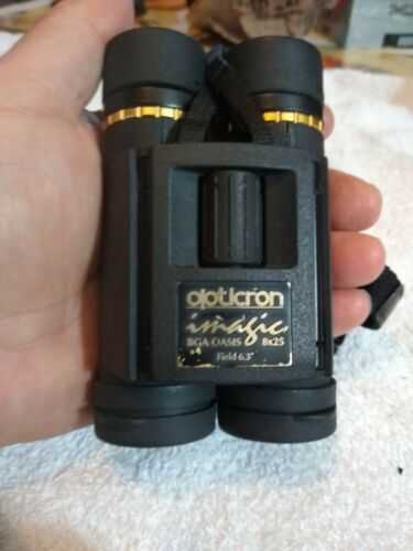 Opticron Imagic BGA Oasis 10 X 25 Nitrogen filled, w/proof binoculars, an case.