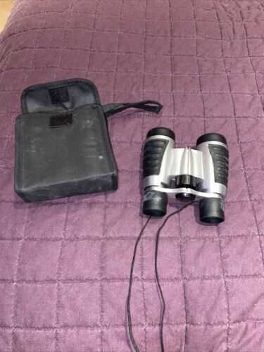 C) Black Binoculars With Orange Eye Hole