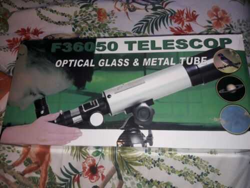 F36050 Telescope Optical Glass and Metal Tube Vgc with tripod stand