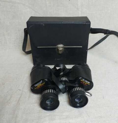 Set of Tasco Zoom 7X 15 x 35 Binoculars and Case