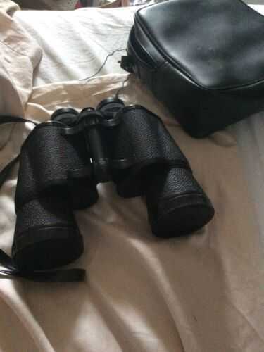 Tasco Binoculars.  Complete With Carry Case And Cleaning Cloth.