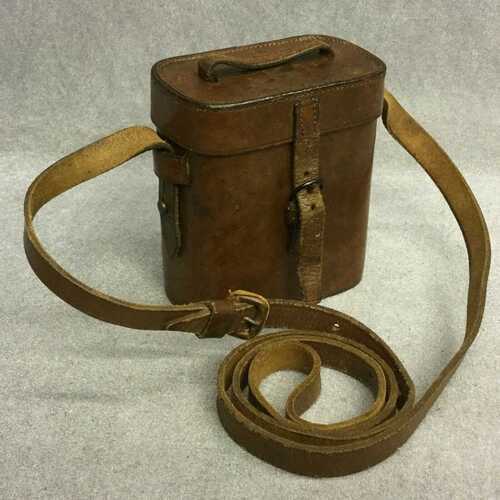 Binocular gallilean full leather with original strap.