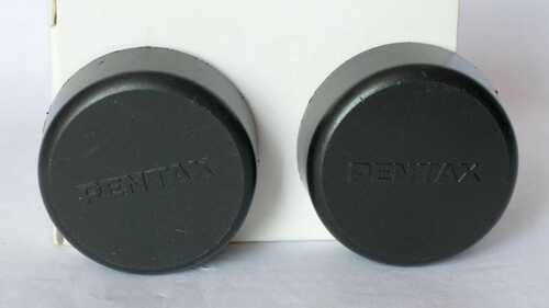 Pair of Pentax 31mm binocular caps.