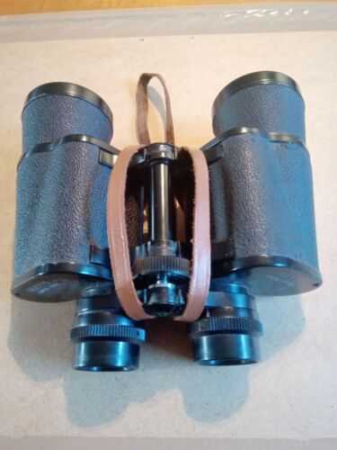 Pair Of Binoculars 10x50 Coated Optics. Boots Empire Made. No Carrying Case....