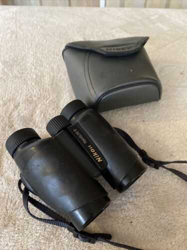 Nikon 10 x 25 Travelite V - 5 degree Compact Binoculars with Belt Carry Case