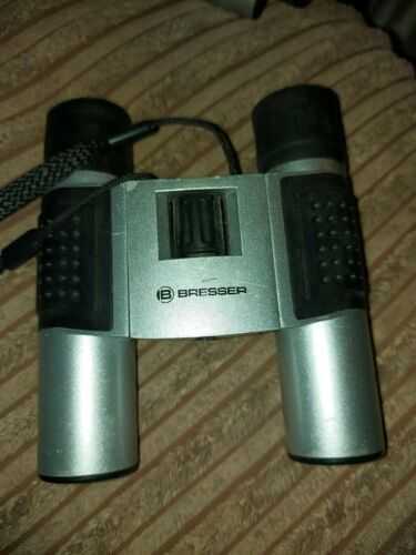 Bresser Binoculars  10x25 In Used Condition