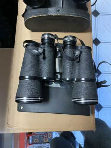 3 binoculars with cases