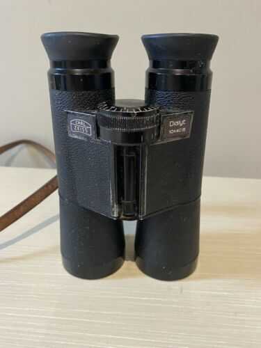 Carl Zeiss Vintage Dialyt 10x40 B Binoculars With Leather Neck Strap Attached.