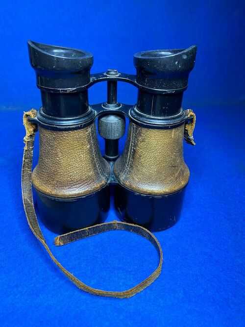 VINTAGE BINOCULARS by H.HUGHES and SON of LONDON LEATHER CUFF