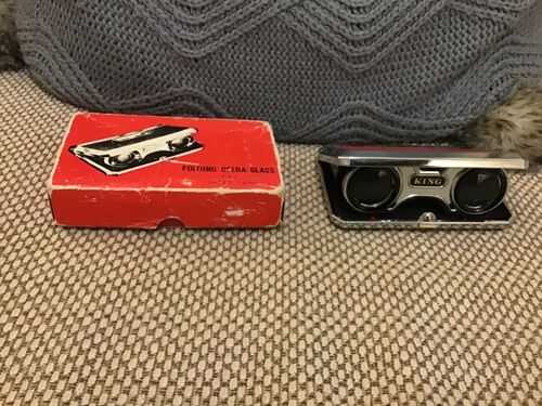 Vintage KING folding opera glasses. 2.5 x coated lens.red cover. Boxed