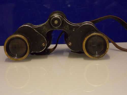 A pair of 8X24 Carl Zeiss Jena Binoculars,Turactem, 1187971, 408 Strand London.