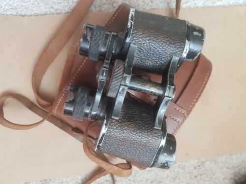 Vintage Leather Covered Binoculars Cased retailed by Sinclair Whitehall London