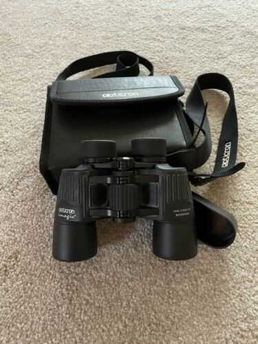 Opticron 10 x 42 binoculars in carry case